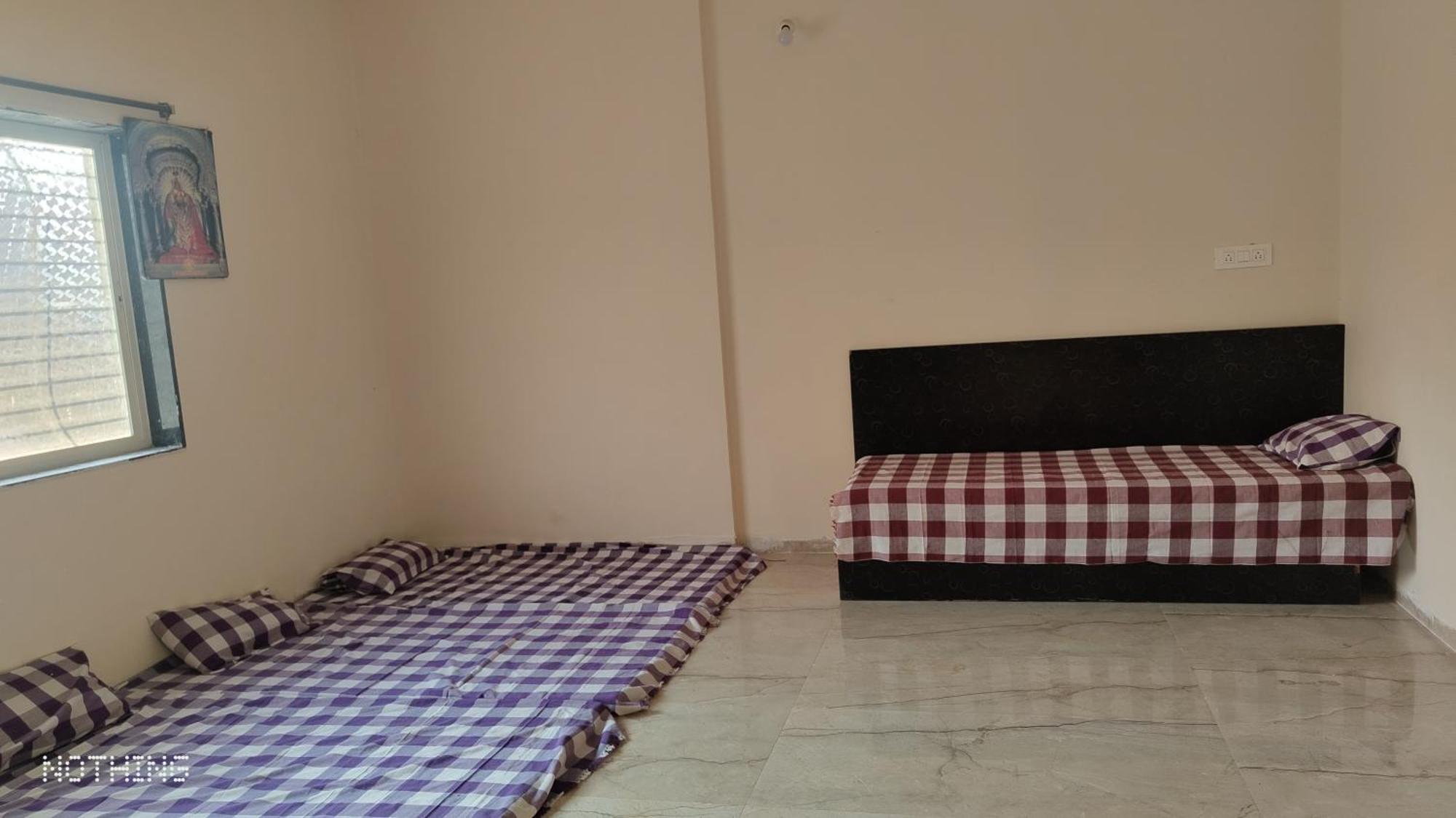 Отель Aadishkti Bhakt Nivas Tuljapur Номер фото